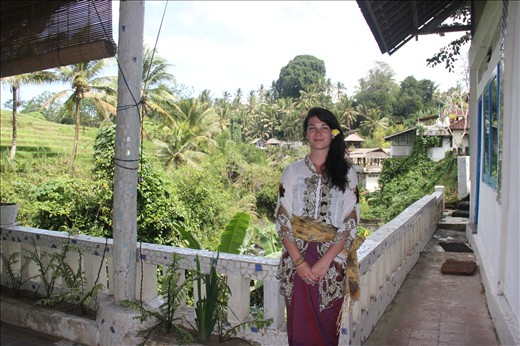 In traditional Balinese dress