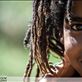 Rastafarian girl in Francshhoek. Very underdeveloped semi-city community.