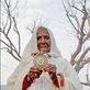 Old lady begging in the streets of Pushkar in Rajasthan,India.